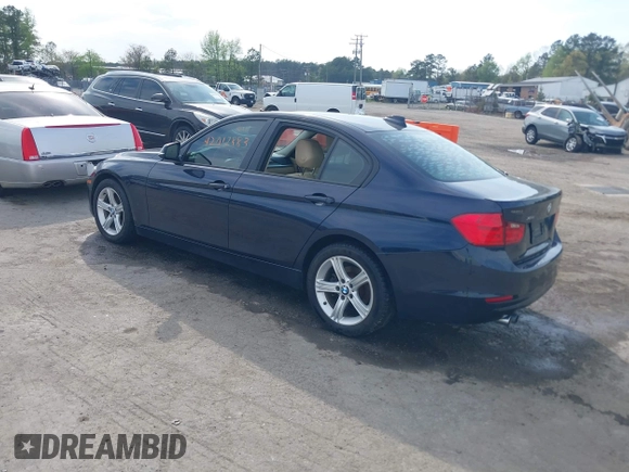 2013 BMW 3 Series 328i xDrive with VIN WBA3B5G53DNS02293, listed as a IAAI auction lot 42012883 with 243,490 mi miles. Bid and sale history available at carsss.com. Image 3.