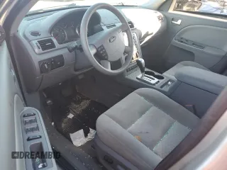 2006 Ford Five Hundred SE с VIN 1FAFP23146G157297, выставлен на аукционе Copart как лот 46508745 с пробегом 91 021 миль миль и Списание • Salvage title. История ставок и продаж доступна на DreamBid. Изображение 8.