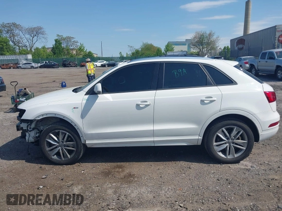 2018 Audi Q3 Premium with VIN WA1ECCFS3JR016577, listed as a IAAI auction lot 42177891 with 91,876 mi miles and . Bid and sale history available at DreamBid. Image 14.