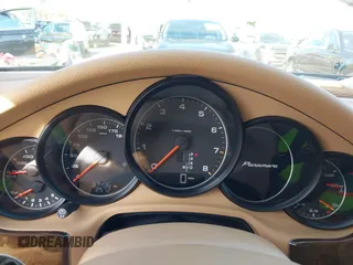 2015 Porsche Panamera 4 z VIN WP0AA2A76FL000746, wystawiony jako IAAI lot #41411279 z przebiegiem 37 496 mil mil oraz . Historia ofert i sprzedaży dostępna na DreamBid. Obrazek 7.