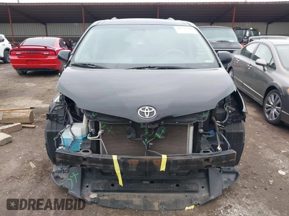 2011 Toyota Sienna XLE AAS with VIN 5TDYK3DC9BS071636, listed as a IAAI auction lot 41972332 with 204,477 mi miles and . Bid and sale history available at DreamBid. Image 13.