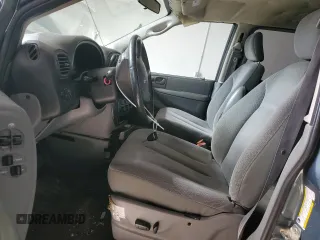 2005 Dodge Caravan SXT with VIN 2D4GP44L95R462451, listed as a Copart auction lot 50413125 with 148,573 mi miles and Salvage title. Bid and sale history available at DreamBid. Image 7.