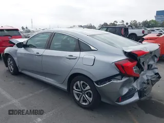 2017 Honda Civic LX with VIN 2HGFC2F5XHH562089, listed as a IAAI auction lot 42010207 with 99,809 mi miles and . Bid and sale history available at DreamBid. Image 14.