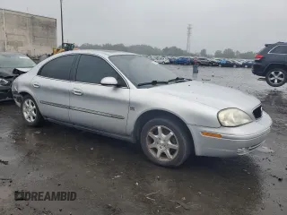 2001 Mercury Sable LS with VIN 1MEHM55S91A615364, listed as a Copart auction lot 73026454 with 85,273 mi miles and Salvage Title. Bid and sale history available at DreamBid. Image 4.