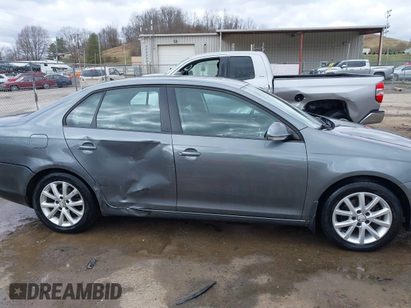 2010 Volkswagen Jetta SE with VIN 3VWRZ7AJ5AM162053, listed as a IAAI auction lot 41811153 with 141,988 mi miles and . Bid and sale history available at DreamBid. Image 13.