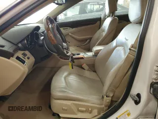 2012 Cadillac CTS Luxury with VIN 1G6DG5E57C0125969, listed as a Copart auction lot 49002865 with 105,800 mi miles and Salvage Title. Bid and sale history available at DreamBid. Image 7.