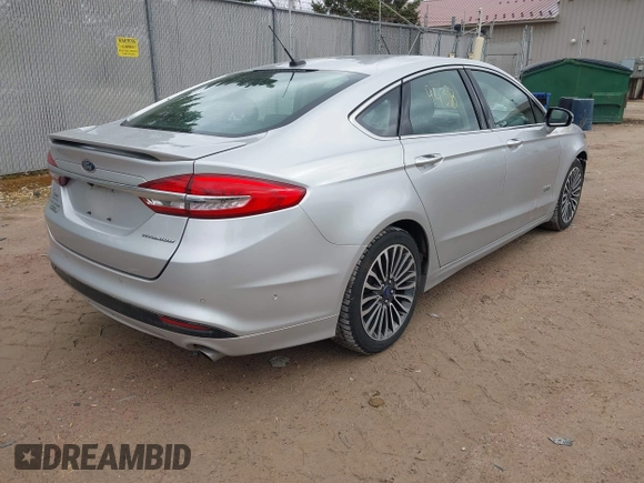 2017 Ford Fusion Titanium with VIN 3FA6P0SU2HR153423, listed as a IAAI auction lot 42029438 with 106,596 mi miles and . Bid and sale history available at DreamBid. Image 4.