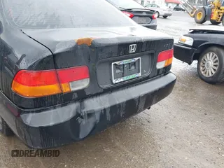 1998 Honda Civic DX with VIN 1HGEJ6121WL063073, listed as a IAAI auction lot 41711152 with 163,267 mi miles. Bid and sale history available at carsss.com. Image 6.