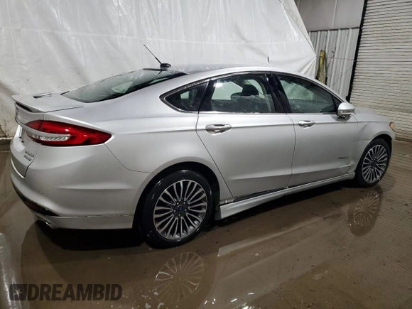 2017 Ford Fusion Hybrid Titanium with VIN 3FA6P0RU7HR383920, listed as a Copart auction lot 56320585 with 20,446 mi miles and Non repairable. Bid and sale history available at DreamBid. Image 3.
