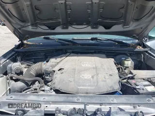 2015 Toyota Tacoma PreRunner with VIN 3TMJU4GN9FM179890, listed as a IAAI auction lot 42225923 with 160,000 mi miles and . Bid and sale history available at DreamBid. Image 10.