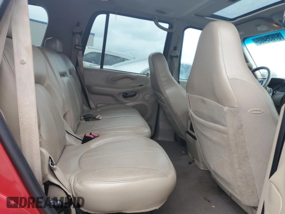 2002 Ford Expedition XLT with VIN 1FMEU17L02LA79716, listed as a Copart auction lot 57635465 with 230,298 mi miles and Salvage title. Bid and sale history available at DreamBid. Image 11.