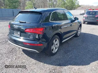 2018 Audi Q5 Premium Plus with VIN WA1BNAFY2J2248778, listed as a IAAI auction lot 42055696 with 100,679 mi miles. Bid and sale history available at carsss.com. Image 4.