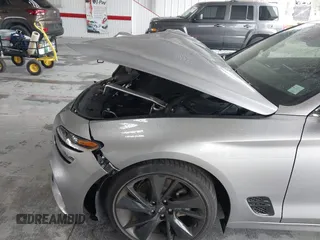 2023 Genesis G70 2.0T z VIN KMTG34TA8PU111790, wystawiony jako IAAI lot #41390217 z przebiegiem 35 303 mil mil oraz . Historia ofert i sprzedaży dostępna na DreamBid. Obrazek 6.