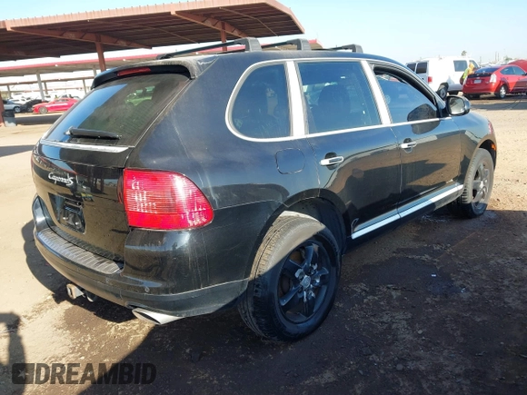 2005 Porsche Cayenne S with VIN WP1AB29P05LA63999, listed as a IAAI auction lot 41479500 with 157,957 mi miles. Bid and sale history available at carsss.com. Image 4.