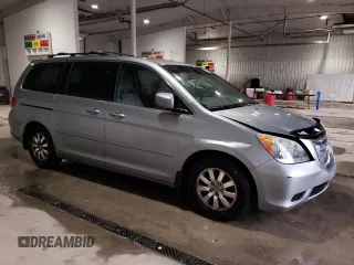 2010 Honda Odyssey EX with VIN 5FNRL3H42AB045192, listed as a Copart auction lot 55817925 with 133,712 mi miles and Salvage Title. Bid and sale history available at DreamBid. Image 4.