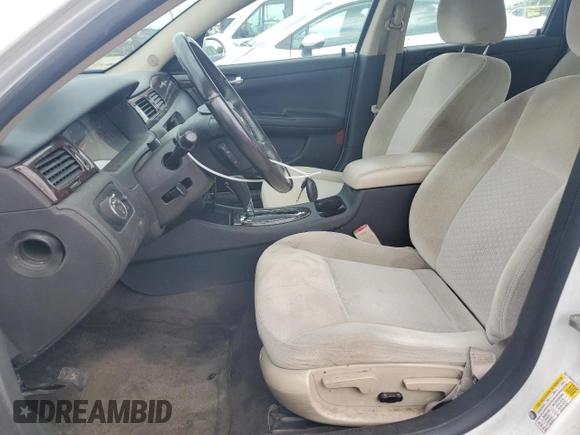 2014 Chevrolet Impala LS with VIN 2G1WA5E31E1161176, listed as a Copart auction lot 56679835 with 145,290 mi miles and Salvage title. Bid and sale history available at DreamBid. Image 7.