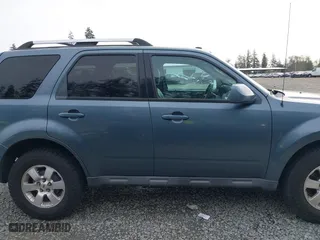 2010 Ford Escape Limited with VIN 1FMCU9EG1AKB89593, listed as a IAAI auction lot 41993888 with 121,175 mi miles. Bid and sale history available at carsss.com. Image 13.