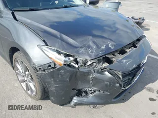 2018 Mazda 3 Touring with VIN 3MZBN1L32JM268582, listed as a IAAI auction lot 42072435 with 61,417 mi miles. Bid and sale history available at carsss.com. Image 6.