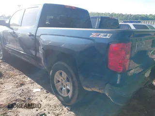 2016 Chevrolet Silverado 1500 LT with VIN 3GCUKREC2GG245116, listed as a IAAI auction lot 42036567 with 229,679 mi miles and . Bid and sale history available at DreamBid. Image 3.