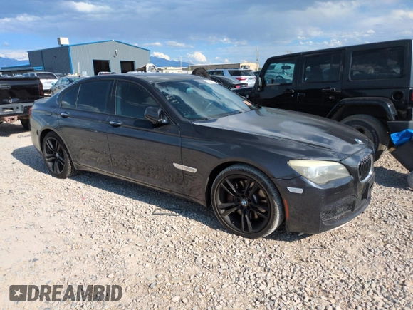 2011 BMW 7 Series 750i with VIN WBAKA8C59BCY36660, listed as a Copart auction lot 64260145 with 121,047 mi miles and Clean title. Bid and sale history available at DreamBid. Image 4.