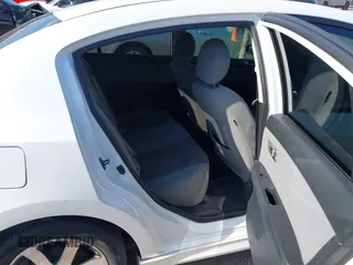 2012 Nissan Sentra SR with VIN 3N1AB6AP8CL765965, listed as a IAAI auction lot 42564529 with 128,511 mi miles and . Bid and sale history available at DreamBid. Image 8.