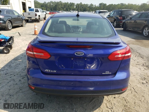 2015 Ford Focus SE with VIN 1FADP3F2XFL299193, listed as a Copart auction lot 59744715 with 141,317 mi miles and Salvage title. Bid and sale history available at DreamBid. Image 6.
