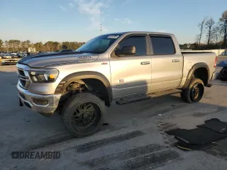 2019 Ram 1500 Tradesman with VIN 1C6RREGT1KN590345, listed as a Copart auction lot 49413505 with 128,091 mi miles and Salvage Title. Bid and sale history available at carsss.com. Image 1.