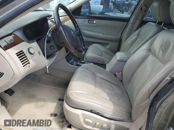 2011 Cadillac DTS Premium Collection z VIN 1G6KH5E65BU119804, wystawiony jako Copart lot #54264775 z przebiegiem 138 454 mil mil oraz Szkoda całkowita • Salvage title. Historia ofert i sprzedaży dostępna na DreamBid. Obrazek 7.