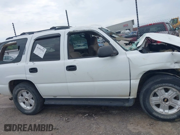 2002 Chevrolet Tahoe LT with VIN 1GNEC13Z52J341962, listed as a IAAI auction lot 42391522 with 239,452 mi miles and . Bid and sale history available at DreamBid. Image 13.