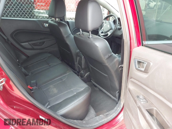 2015 Ford Fiesta Titanium z VIN 3FADP4FJ1FM171680, wystawiony jako IAAI lot #42383105 z przebiegiem 51 396 mil mil oraz . Historia ofert i sprzedaży dostępna na DreamBid. Obrazek 8.