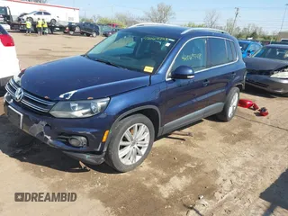 2012 Volkswagen Tiguan S with VIN WVGBV7AX2CW566981, listed as a IAAI auction lot 42069748 with 153,613 mi miles and . Bid and sale history available at DreamBid. Image 2.
