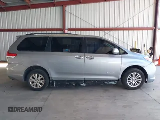 2011 Toyota Sienna XLE AAS with VIN 5TDYK3DC0BS107522, listed as a IAAI auction lot 42207305 with 171,857 mi miles and . Bid and sale history available at DreamBid. Image 13.