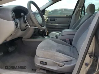 2004 Ford Taurus SE with VIN 1FAFP53U24A137741, listed as a Copart auction lot 54313915 with 92,739 mi miles and Salvage Title. Bid and sale history available at DreamBid. Image 7.