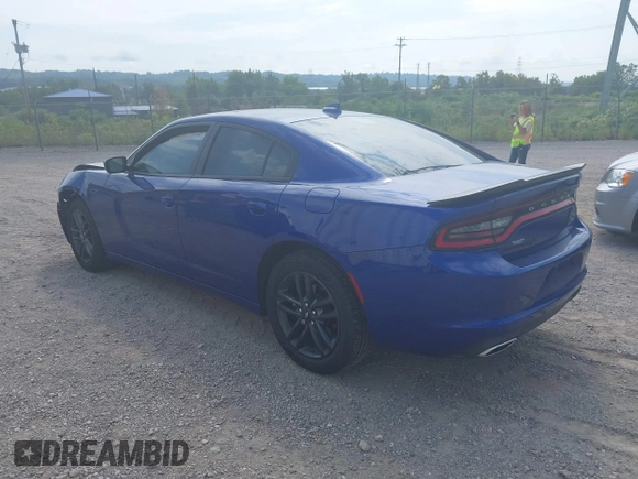 2019 Dodge Charger SXT with VIN 2C3CDXJG4KH550424, listed as a IAAI auction lot 40224159 with 56,988 mi miles and . Bid and sale history available at DreamBid. Image 3.