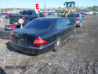 2004 Mercedes-Benz S-Class 5.0L with VIN WDBNG75J24A414813, listed as a IAAI auction lot 41911565 with 999,999 mi miles. Bid and sale history available at carsss.com. Image 4.