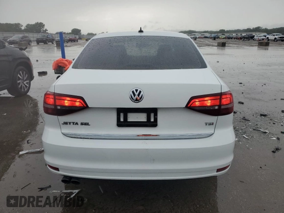 2017 Volkswagen Jetta SEL z VIN 3VWL17AJ8HM252191, wystawiony jako Copart lot #59331425 z przebiegiem 77 537 mil mil oraz Szkoda całkowita • Salvage title. Historia ofert i sprzedaży dostępna na DreamBid. Obrazek 6.