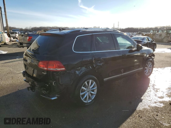 2016 Volkswagen Touareg Sport z VIN WVGEP9BP3GD004865, wystawiony jako Copart lot #87610915 z przebiegiem Nie podano mil oraz Szkoda całkowita • Salvage title. Historia ofert i sprzedaży dostępna na DreamBid. Obrazek 3.