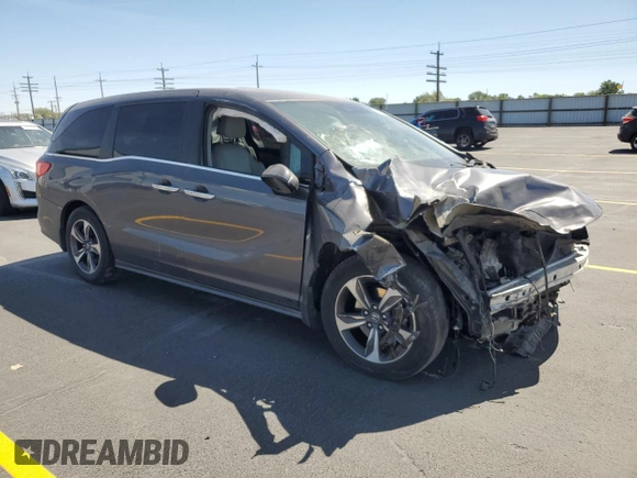 2020 Honda Odyssey Touring with VIN 5FNRL6H84LB032418, listed as a Copart auction lot 59118565 with Not provided miles and Salvage title. Bid and sale history available at DreamBid. Image 4.