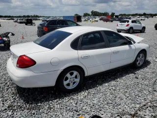 2003 Ford Taurus SES Standard z VIN 1FAFP55U93A162213, wystawiony jako Copart lot #54657645 z przebiegiem 43 756 mil mil oraz Szkoda całkowita • Salvage title. Historia ofert i sprzedaży dostępna na DreamBid. Obrazek 3.