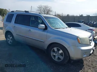2011 Honda Pilot EX with VIN 5FNYF4H42BB040455, listed as a IAAI auction lot 42039366 with 169,469 mi miles. Bid and sale history available at carsss.com. Image 1.