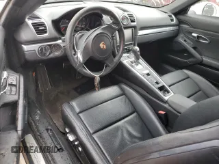 2013 Porsche Boxster z VIN WP0CA2A85DS110160, wystawiony jako Copart lot #63689574 z przebiegiem 32 678 mil mil oraz Szkoda całkowita • Salvage title. Historia ofert i sprzedaży dostępna na DreamBid. Obrazek 8.