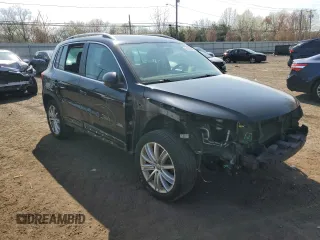 2013 Volkswagen Tiguan SE z VIN WVGBV3AX3DW078813, wystawiony jako Copart lot #54238465 z przebiegiem 119 092 mil mil oraz Szkoda całkowita • Salvage title. Historia ofert i sprzedaży dostępna na DreamBid. Obrazek 4.