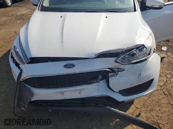 2017 Ford Focus SE with VIN 1FADP3F26HL313478, listed as a Copart auction lot 57078015 with 56,807 mi miles and Salvage title. Bid and sale history available at DreamBid. Image 11.