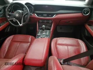 2018 Alfa Romeo Stelvio z VIN ZASFAKAN7J7B72474, wystawiony jako Copart lot #58086545 z przebiegiem Nie podano mil oraz Czysty tytuł • Clean title. Historia ofert i sprzedaży dostępna na DreamBid. Obrazek 8.