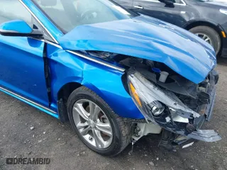 2019 Hyundai Sonata Sport with VIN 5NPE34AF2KH735382, listed as a IAAI auction lot 41815754 with 136,432 mi miles. Bid and sale history available at carsss.com. Image 6.