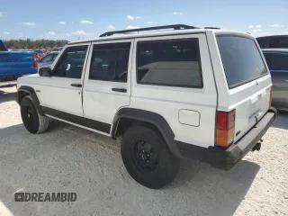 1994 Jeep Cherokee SE with VIN 1J4FT28SXRL151422, listed as a Copart auction lot 77358594 with 74,628 mi miles and Salvage Title. Bid and sale history available at carsss.com. Image 2.