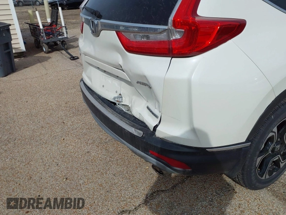 2017 Honda CR-V Touring with VIN 5J6RW2H95HL044505, listed as a IAAI auction lot 41856975 with 117,826 mi miles. Bid and sale history available at carsss.com. Image 6.