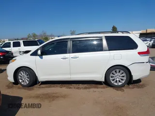 2011 Toyota Sienna XLE AAS with VIN 5TDYK3DCXBS097582, listed as a IAAI auction lot 42233594 with 226,902 mi miles and . Bid and sale history available at DreamBid. Image 14.