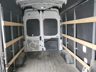2021 Ford Transit Cargo с VIN 1FTBR1X87MKA53899, выставлен на аукционе Copart как лот 53969705 с пробегом 94 115 миль миль и Списание • Salvage title. История ставок и продаж доступна на DreamBid. Изображение 10.