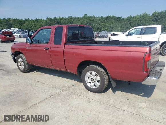 2000 Nissan Frontier XE with VIN 1N6DD26SXYC393054, listed as a Copart auction lot 62410125 with 106,319 mi miles and Salvage title. Bid and sale history available at DreamBid. Image 2.